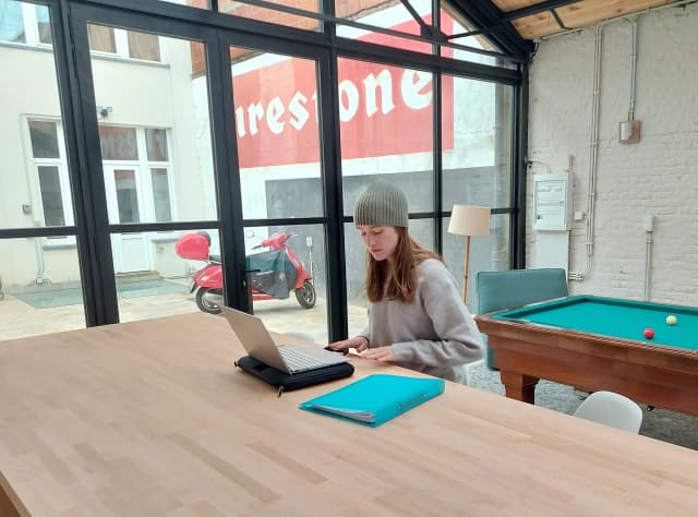 Coworker working in the lounge area
